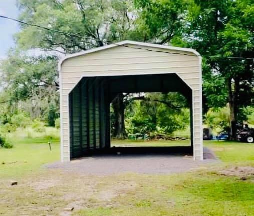 Garages & Carports: 18W x 31L x 12H with Two 16 x 11 Frameouts — Handi-House building