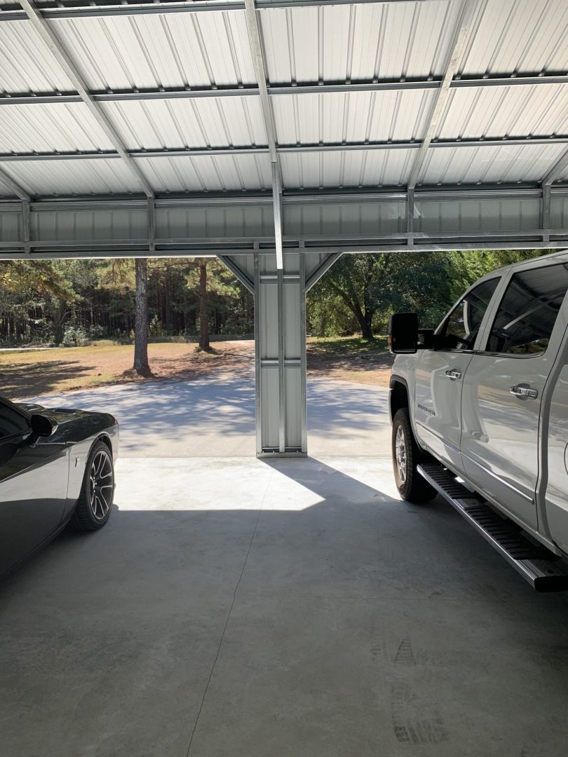 Garage: 24x31x10 Vertical Roof 2 Car Metal Garage — image from the original listing